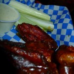 Wings in Last Chance wing sauce with homemade Blue Cheese dressing