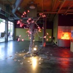 Lit tree art installation in vacant space